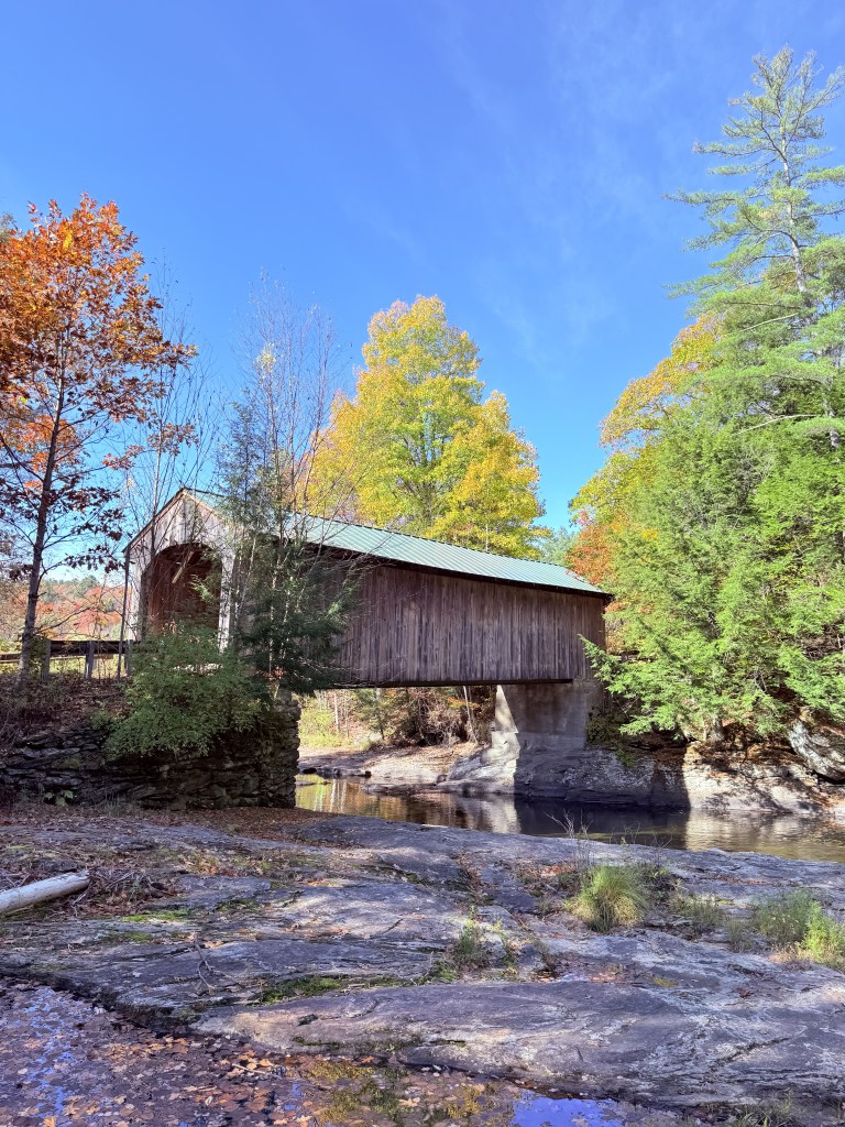 covered bridge in vermont in autumn